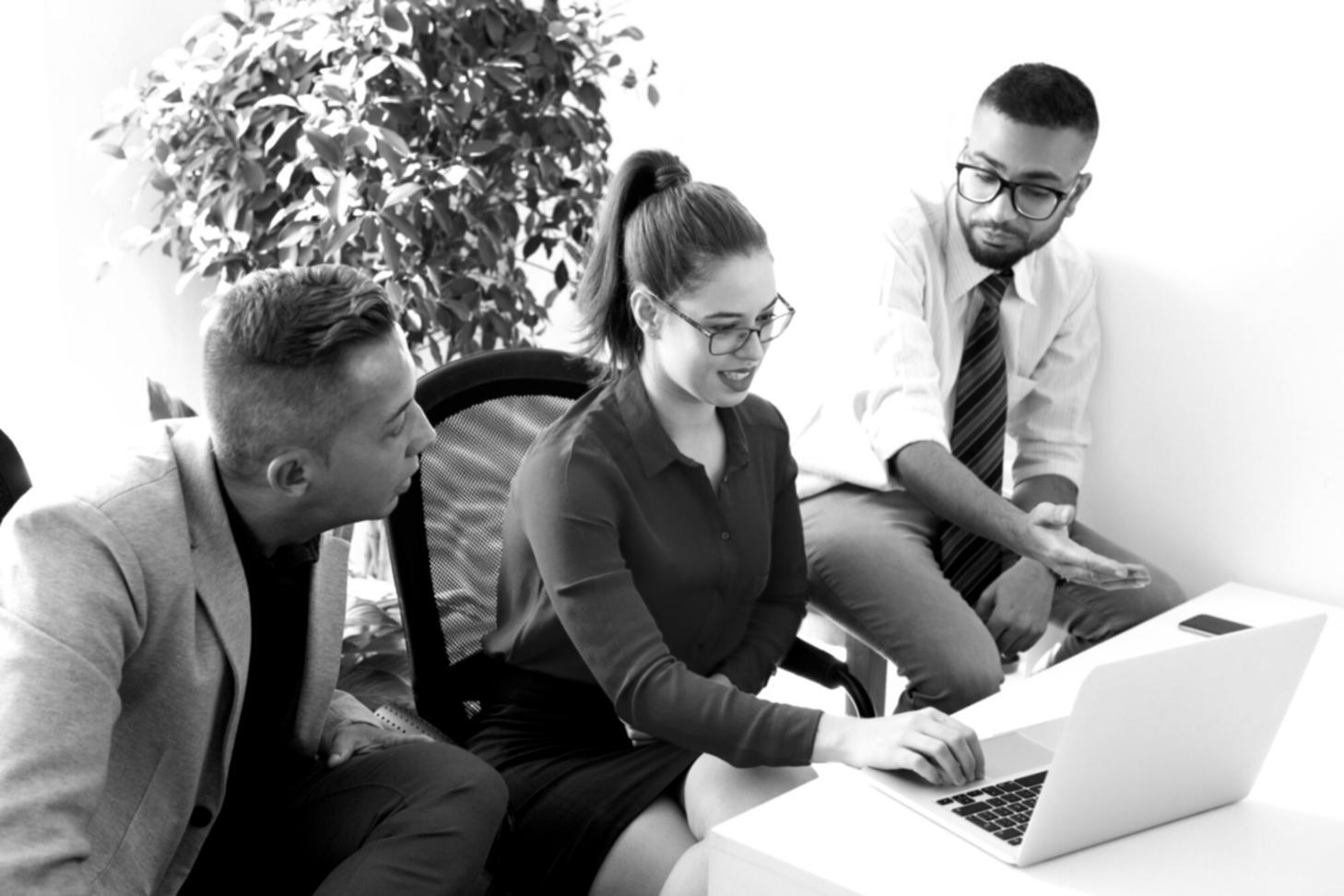 Business strategy session with financial charts and documentation